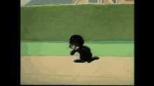 a black cat is walking down a sidewalk in a cartoon .