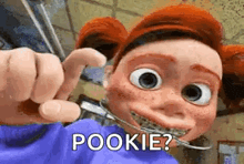 a cartoon character with braces on his teeth is holding a pair of scissors and saying pookie ?
