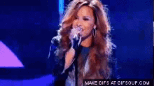 Hairflip GIF - Demi Lovato Hair Flip Singing GIFs