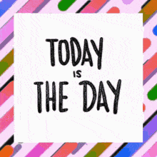 a sign that says today is the day on a colorful striped background