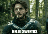 a man with a beard is smoking a cigarette in a forest .
