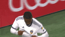 Pointing At The Jersey Logo Douglas Costa GIF - Pointing At The Jersey Logo Douglas Costa La Galaxy GIFs