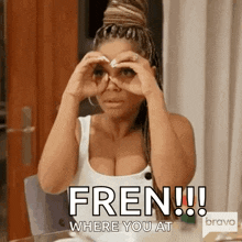 a woman is sitting at a table looking through binoculars with the words fren where you at written below her .