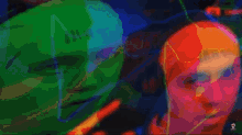 a colorful painting of a man 's face with a skull on the bottom left