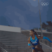 running nia ali international olympic committee sprinting race to the finish line