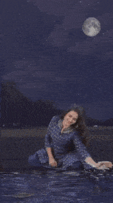 a painting of a woman sitting in the water with the words ' walangum ' on the bottom