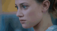 a close up of a person 's fist being thrown at a table .