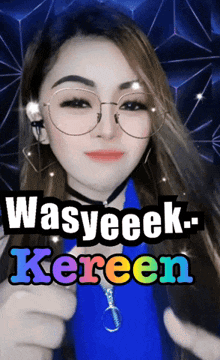 a woman wearing glasses is giving a thumbs up with the words wasyeeek-kereen behind her