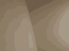 a corner of a white wall with a diagonal line