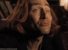 a close up of a man 's face with the caption " itsscottiesstark " on the bottom