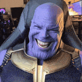 a statue of thanos is smiling with his mouth open