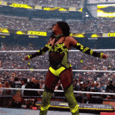 a woman in a wrestling ring with caution tape around her