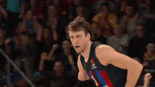 a man in a basketball uniform with the number 6 on it