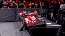 Brock Lesnar Flips Table GIF - Brock Lesnar Flips Table Braun Strowman GIFs