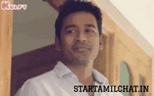a man in a white shirt is smiling and the website starttamilchat.in is visible in the corner