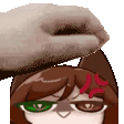 a person is petting a cartoon character 's head with their hand .