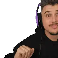 a man wearing purple headphones is making a funny face