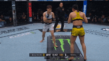 two women are fighting in a boxing ring sponsored by monster