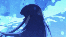 a girl with a flower in her hair is swimming in the ocean