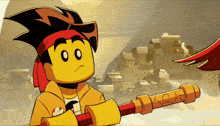 a cartoon character with a red bandana on his head holds a stick