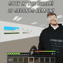a man in a black hoodie is standing in a room with the words stay in the circle 29 seconds remain