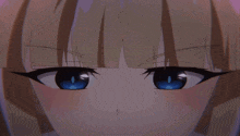 a close up of a girl 's face with her eyes closed