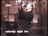 a video of a man playing a guitar on saturday night live in 1993