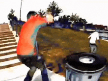 a man in a red vest stands next to a trash can