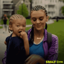 upbeat chilling outdoors braids mother and son