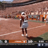 a football game between texas and iowa is being played