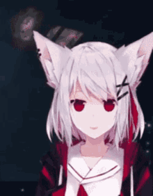 a girl with cat ears and red eyes is wearing a black and red jacket .