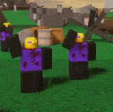 two roblox characters are standing in a field with barrels in the background and a sign that says " u.s. army "