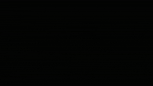 it is a black and white photo of a statue of liberty in the dark .