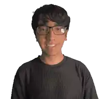a young man wearing glasses and a shirt that says zaiden