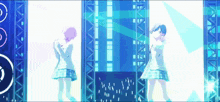 a couple of girls are dancing on a stage