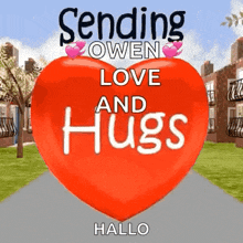 a red heart with the words `` sending owen love and hugs '' on it