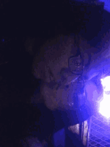 a close up of a person 's face with glasses