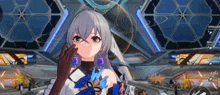 a girl with gray hair and blue earrings is being kissed by someone