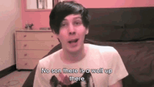 a young man in a white t-shirt says no son there is a wolf up there