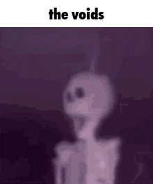 a skeleton is standing in front of a microphone in a dark room .