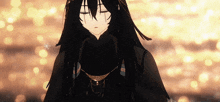 a girl with long black hair is standing in front of a blurred background