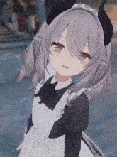a girl with gray hair and horns is wearing a maid outfit