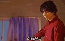 a man in a red shirt is saying o : uhhh ...