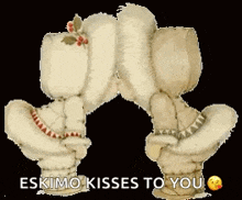 a couple of eskimo kissing each other with the words eskimo kisses to you on the bottom