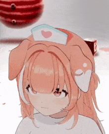 a close up of a girl wearing a nurse cap with a heart on it .