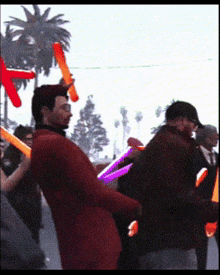 a group of people are holding balloons in their hands