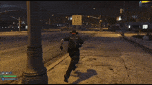 a police officer is laying on the ground with a gun in his hand