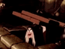 a cartoon character is sitting under a brick wall .
