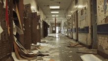 a hallway with a lot of papers on the floor and lockers that say ' a ' on them