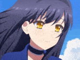 a close up of a girl 's face with yellow eyes